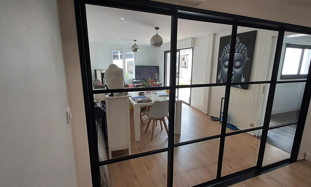 Porte coulissante et verrière style orangerie ARINOX - 