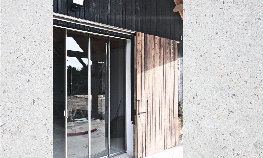 Verrière et porte de garage en INOX 316L adaptés front de mer. - 